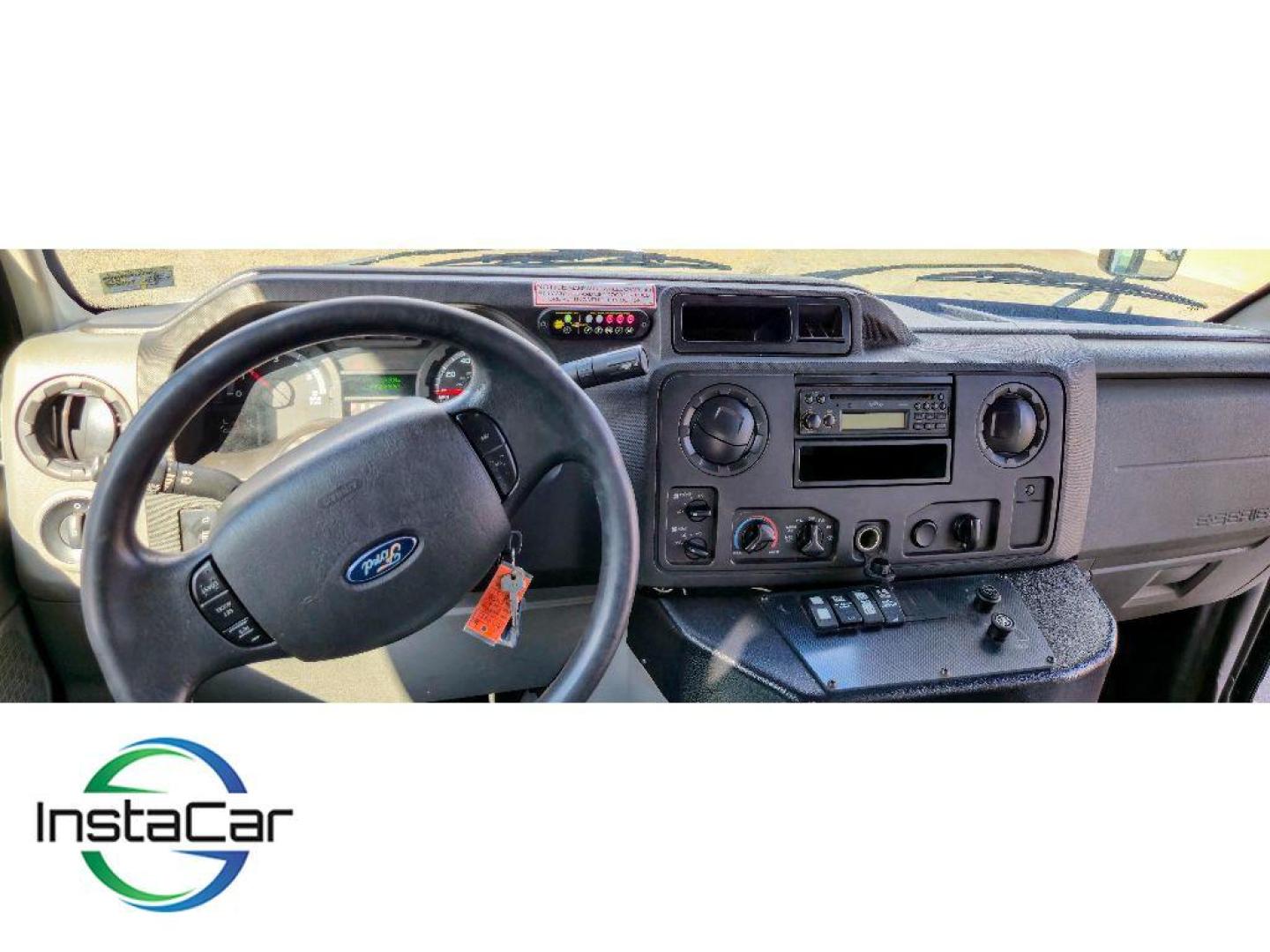 2014 Oxford White /Medium Flint Ford E-450 Super Duty Base (1FDFE4FS4ED) with an V10, 6.8L (415 CID) engine, 5-speed automatic transmission, located at 6520 E. Independence Blvd., Charlotte, NC, 28212, 35.146019, -80.723465 - <b>Equipment</b><br>Enjoy the incredible handling with the rear wheel drive on this unit. This unit shines with clean polished lines coated with an elegant white finish. The Ford E-450 Super Duty has a V10, 6.8L (415 CID) high output engine. Maintaining a stable interior temperature in this Ford E-4 - Photo#12