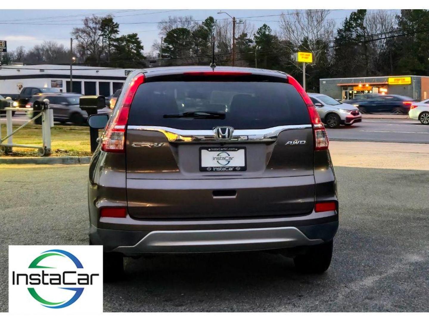 2015 Kona Coffee Metallic /Black Honda CR-V EX (2HKRM4H57FH) with an 4 Cyl, 2.4L engine, CVT transmission, located at 6520 E. Independence Blvd., Charlotte, NC, 28212, 35.146019, -80.723465 - Bluetooth technology is built into the vehicle, keeping your hands on the steering wheel and your focus on the road. See what's behind you with the back up camera on the Honda CR-V. The Honda CR-V has a clear coated brown exterior. Set the temperature exactly where you are most comfortable in this s - Photo#5