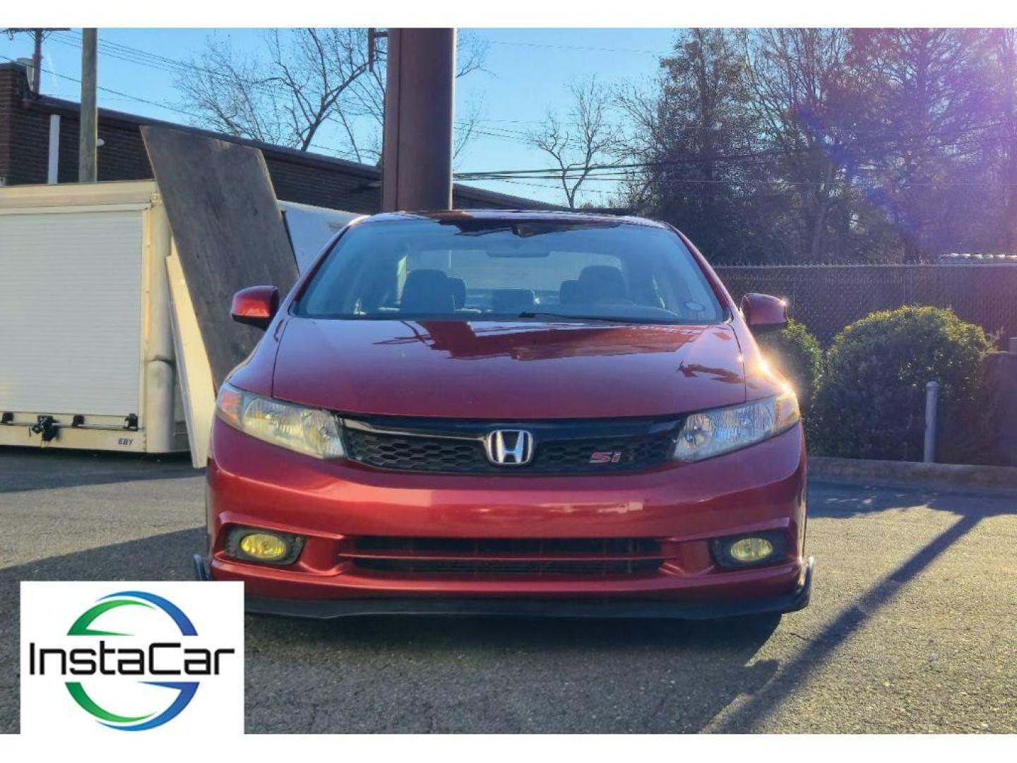 2012 Sunburst Orange Pearl /Black Honda Civic Si (2HGFB6E5XCH) with an 4 Cyl, 2.4L engine, 6-speed manual transmission, located at 6520 E. Independence Blvd., Charlotte, NC, 28212, 35.146019, -80.723465 - Photo#7