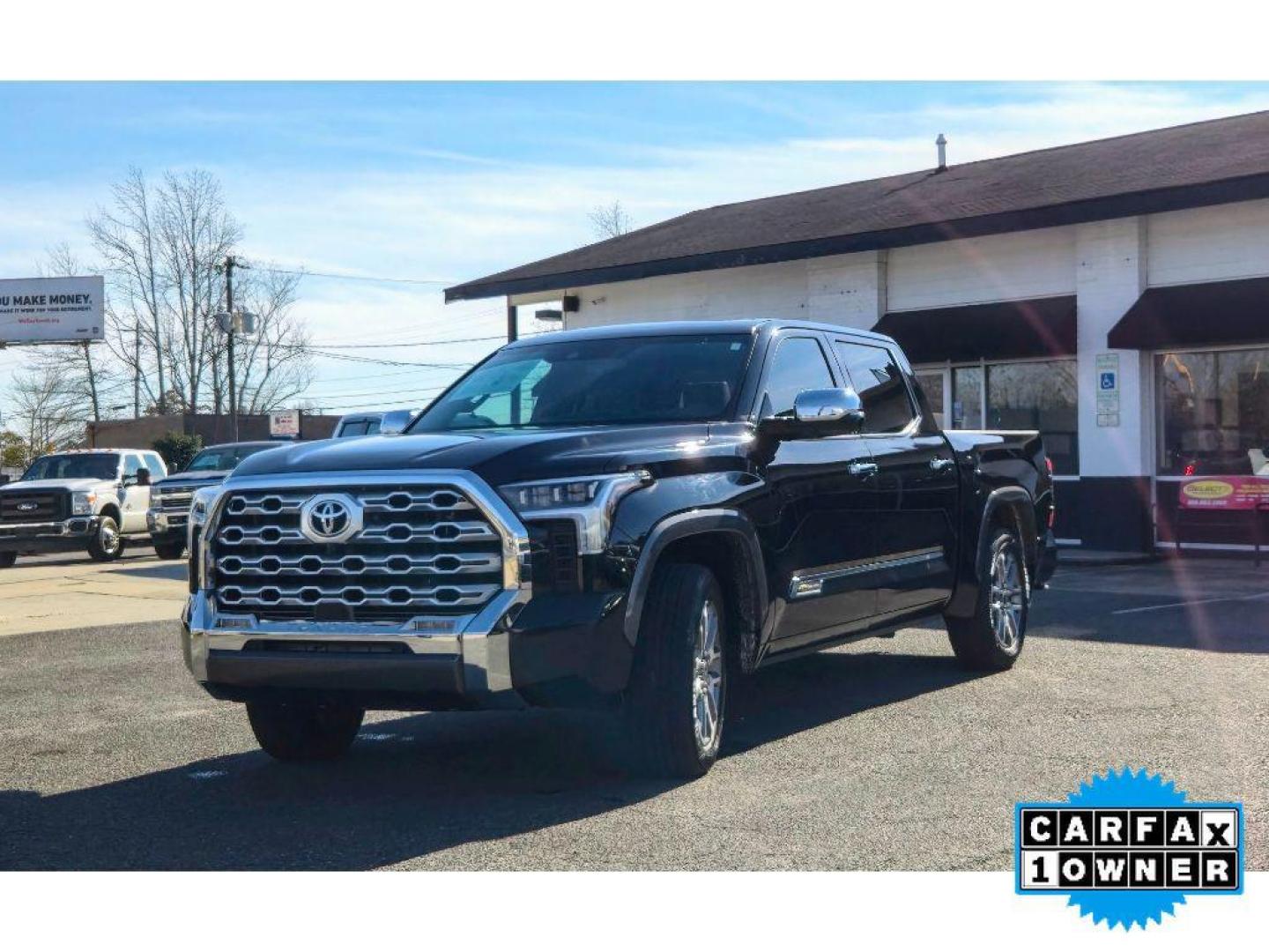 2023 Midnight Black Metallic /Saddle Tan Toyota Tundra 1794 Edition (5TFMA5AB0PX) with an V6, 3.5L (3445 cc) engine, 10-speed automatic transmission, located at 6520 E. Independence Blvd., Charlotte, NC, 28212, 35.146019, -80.723465 - <b>Equipment</b><br>See what's behind you with the back up camera on it. The Toyota Tundra is pure luxury with a heated steering wheel. Bluetooth technology is built into this 2023 Toyota Tundra , keeping your hands on the steering wheel and your focus on the road. This vehicle is a certified CARFAX - Photo#3