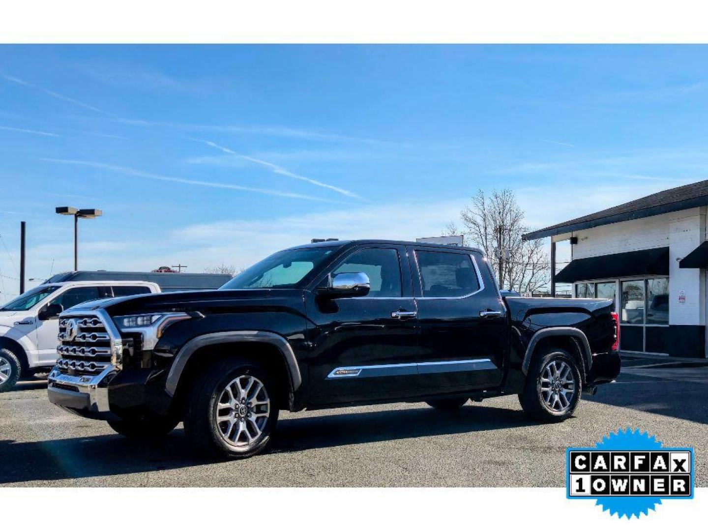 2023 Midnight Black Metallic /Saddle Tan Toyota Tundra 1794 Edition (5TFMA5AB0PX) with an V6, 3.5L (3445 cc) engine, 10-speed automatic transmission, located at 6520 E. Independence Blvd., Charlotte, NC, 28212, 35.146019, -80.723465 - <b>Equipment</b><br>See what's behind you with the back up camera on it. The Toyota Tundra is pure luxury with a heated steering wheel. Bluetooth technology is built into this 2023 Toyota Tundra , keeping your hands on the steering wheel and your focus on the road. This vehicle is a certified CARFAX - Photo#4