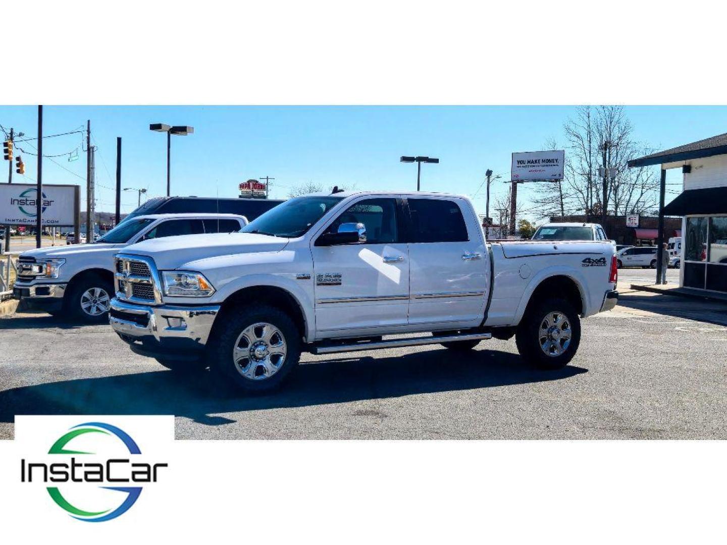 2017 Bright White Clearcoat /Light Frost Beige/Canyon Brown Ram 2500 Laramie (3C6UR5FJ6HG) with an V8, 6.4L engine, 6-speed automatic transmission, located at 6520 E. Independence Blvd., Charlotte, NC, 28212, 35.146019, -80.723465 - <b>Equipment</b><br>The state of the art park assist system will guide you easily into any spot. This unit keeps you comfortable with Auto Climate. The leather seats in the Ram 2500 are a must for buyers looking for comfort, durability, and style. with XM/Sirus Satellite Radio you are no longer res - Photo#1
