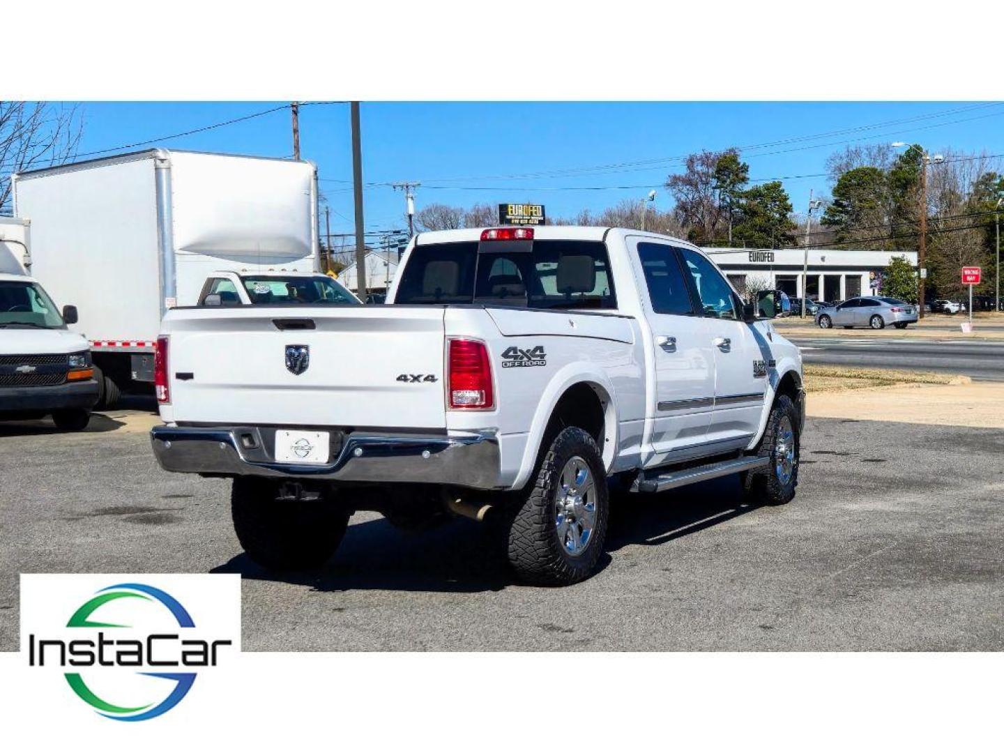 2017 Bright White Clearcoat /Light Frost Beige/Canyon Brown Ram 2500 Laramie (3C6UR5FJ6HG) with an V8, 6.4L engine, 6-speed automatic transmission, located at 6520 E. Independence Blvd., Charlotte, NC, 28212, 35.146019, -80.723465 - <b>Equipment</b><br>The state of the art park assist system will guide you easily into any spot. This unit keeps you comfortable with Auto Climate. The leather seats in the Ram 2500 are a must for buyers looking for comfort, durability, and style. with XM/Sirus Satellite Radio you are no longer res - Photo#7