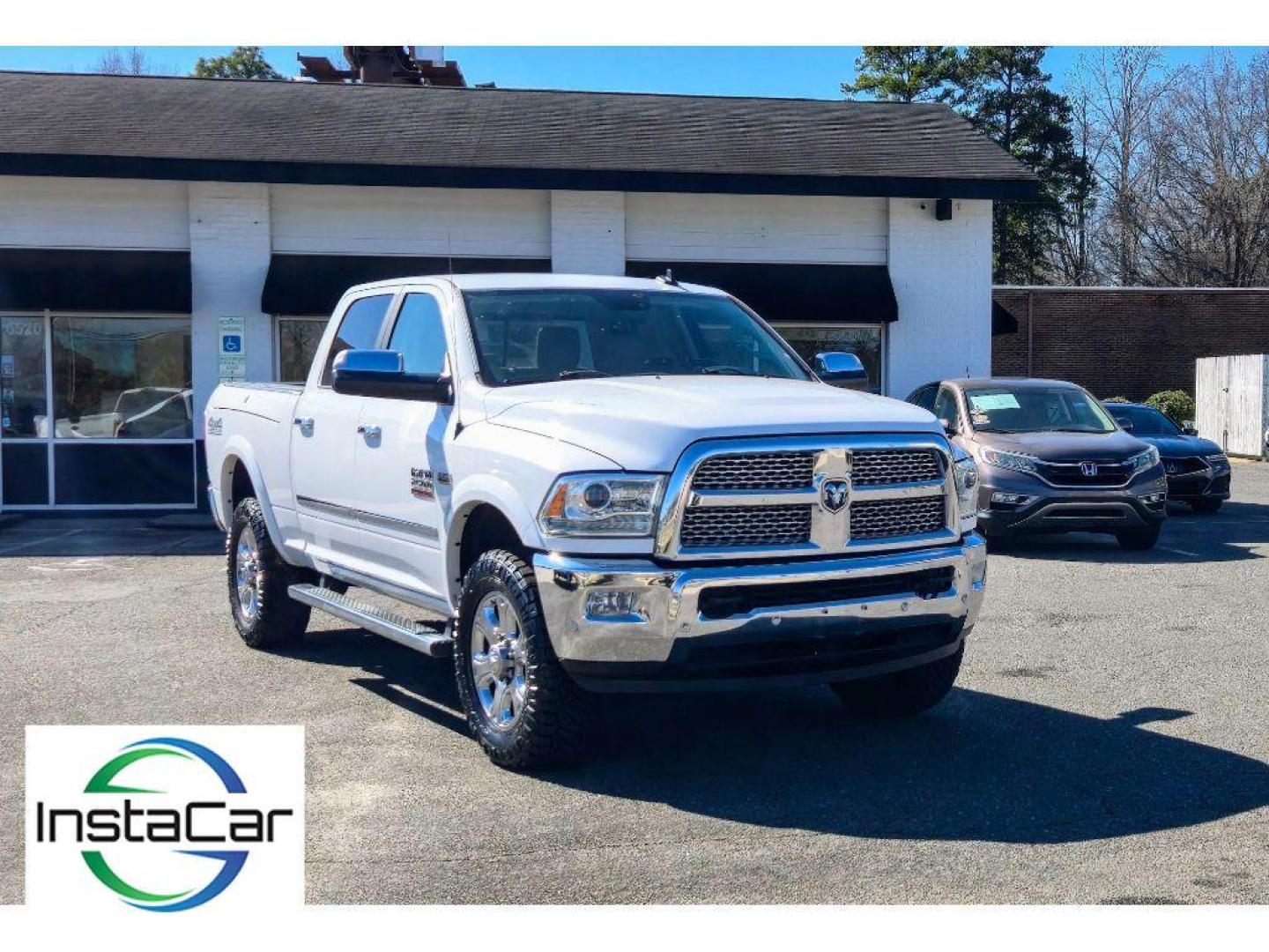 2017 Bright White Clearcoat /Light Frost Beige/Canyon Brown Ram 2500 Laramie (3C6UR5FJ6HG) with an V8, 6.4L engine, 6-speed automatic transmission, located at 6520 E. Independence Blvd., Charlotte, NC, 28212, 35.146019, -80.723465 - <b>Equipment</b><br>The state of the art park assist system will guide you easily into any spot. This unit keeps you comfortable with Auto Climate. The leather seats in the Ram 2500 are a must for buyers looking for comfort, durability, and style. with XM/Sirus Satellite Radio you are no longer res - Photo#12