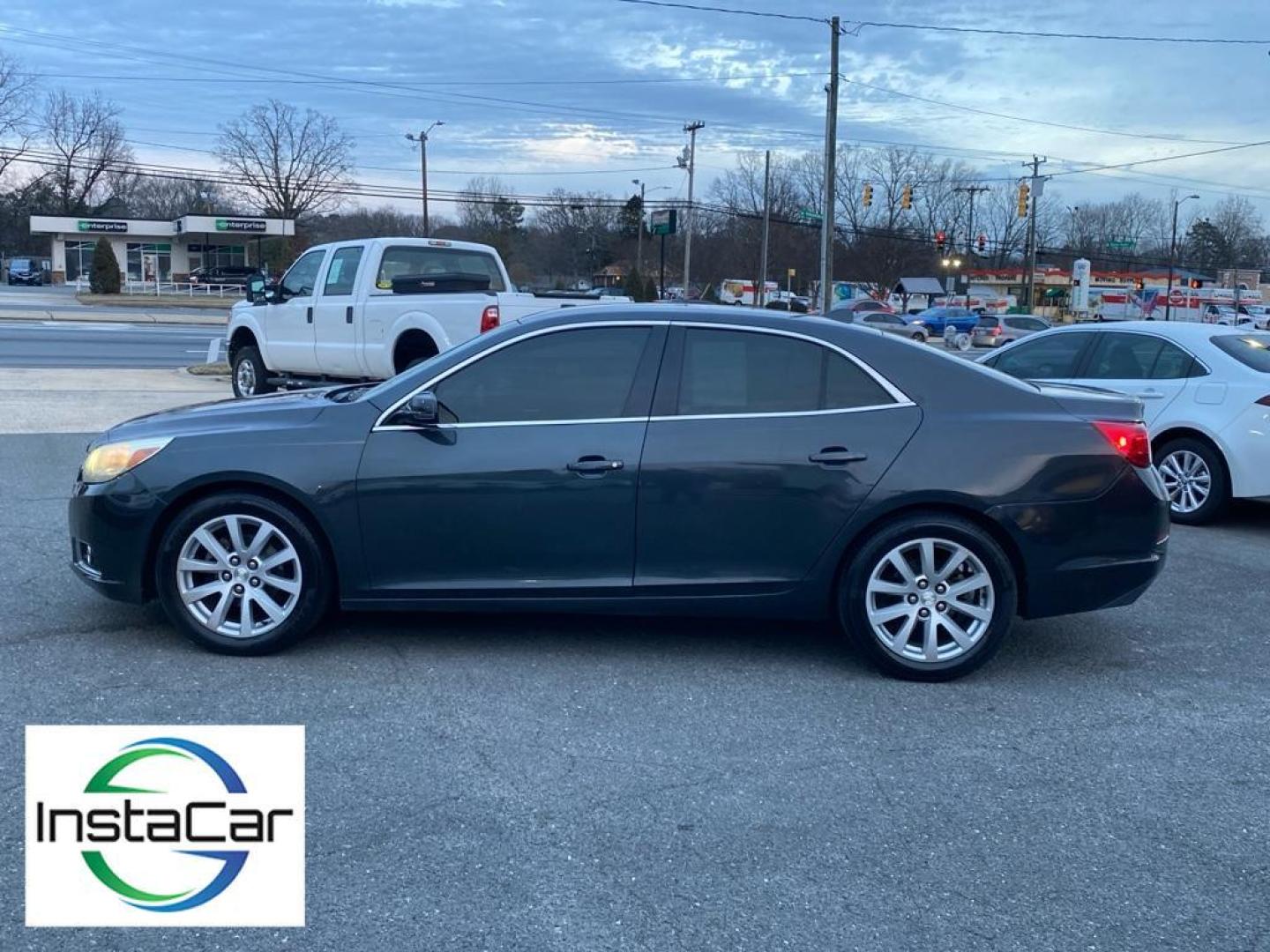 2014 Ashen Gray Metallic /Jet Black/Titanium Chevrolet Malibu LT (1G11E5SL9EF) with an 4 Cyl, 2.5L engine, 6-speed automatic transmission, located at 6520 E. Independence Blvd., Charlotte, NC, 28212, 35.146019, -80.723465 - <b>Equipment</b><br>This unit features a hands-free Bluetooth phone system. The Chevrolet Malibu keeps you comfortable with Auto Climate. The leather seats in this mid-size car are a must for buyers looking for comfort, durability, and style. The Chevrolet Malibu emanates grace with its stylish gray - Photo#6
