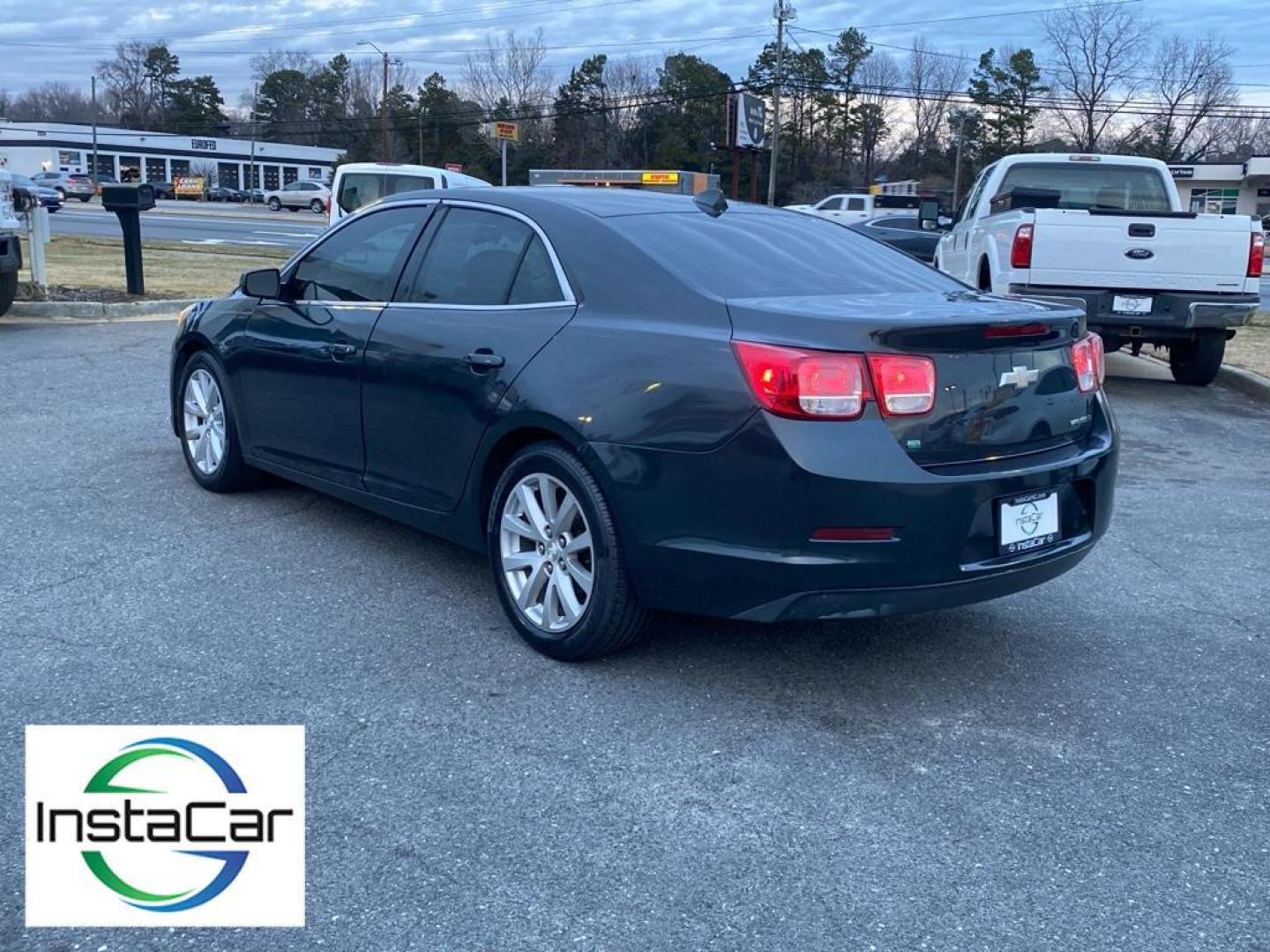 2014 Ashen Gray Metallic /Jet Black/Titanium Chevrolet Malibu LT (1G11E5SL9EF) with an 4 Cyl, 2.5L engine, 6-speed automatic transmission, located at 6520 E. Independence Blvd., Charlotte, NC, 28212, 35.146019, -80.723465 - <b>Equipment</b><br>This unit features a hands-free Bluetooth phone system. The Chevrolet Malibu keeps you comfortable with Auto Climate. The leather seats in this mid-size car are a must for buyers looking for comfort, durability, and style. The Chevrolet Malibu emanates grace with its stylish gray - Photo#7