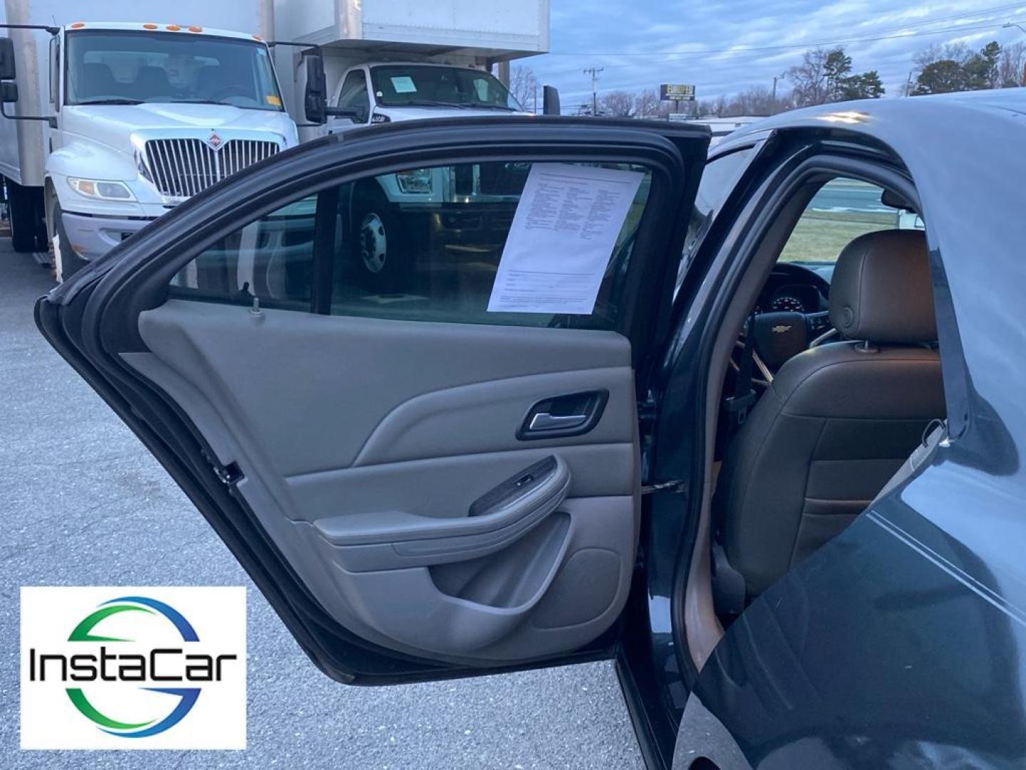 2014 Ashen Gray Metallic /Jet Black/Titanium Chevrolet Malibu LT (1G11E5SL9EF) with an 4 Cyl, 2.5L engine, 6-speed automatic transmission, located at 6520 E. Independence Blvd., Charlotte, NC, 28212, 35.146019, -80.723465 - <b>Equipment</b><br>This unit features a hands-free Bluetooth phone system. The Chevrolet Malibu keeps you comfortable with Auto Climate. The leather seats in this mid-size car are a must for buyers looking for comfort, durability, and style. The Chevrolet Malibu emanates grace with its stylish gray - Photo#16