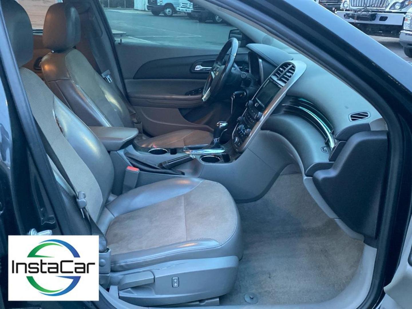 2014 Ashen Gray Metallic /Jet Black/Titanium Chevrolet Malibu LT (1G11E5SL9EF) with an 4 Cyl, 2.5L engine, 6-speed automatic transmission, located at 6520 E. Independence Blvd., Charlotte, NC, 28212, 35.146019, -80.723465 - <b>Equipment</b><br>This unit features a hands-free Bluetooth phone system. The Chevrolet Malibu keeps you comfortable with Auto Climate. The leather seats in this mid-size car are a must for buyers looking for comfort, durability, and style. The Chevrolet Malibu emanates grace with its stylish gray - Photo#22