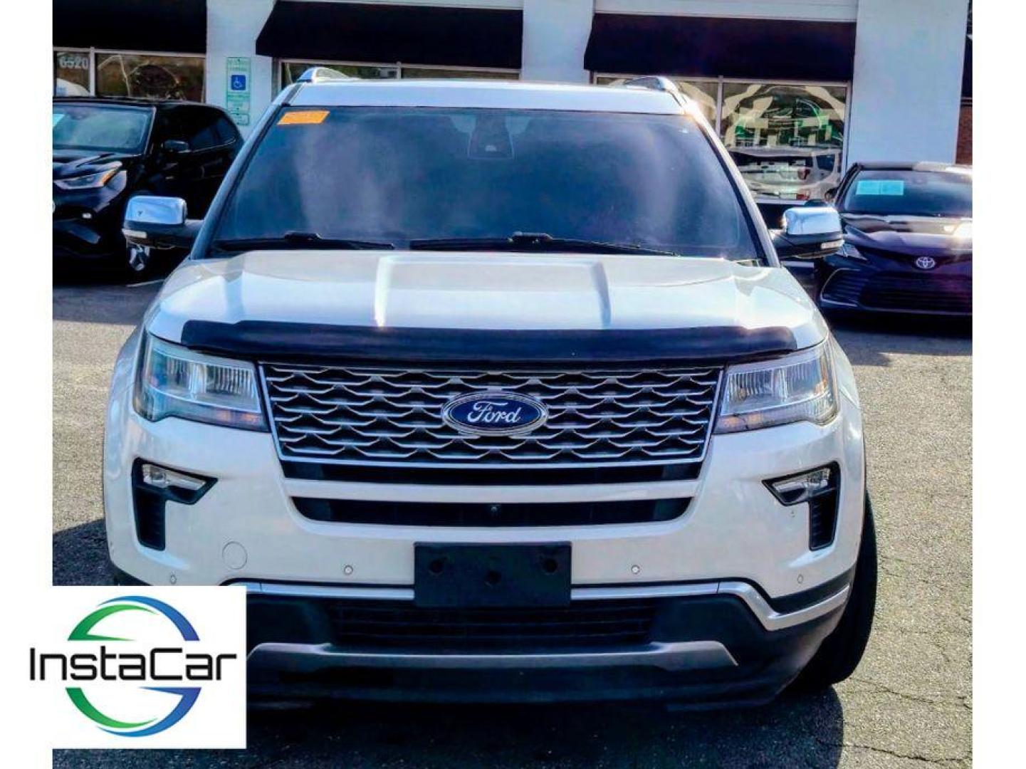 2018 White Platinum Metallic Tri-Coat /Medium Soft Ceramic Ford Explorer Platinum (1FM5K8HT3JG) with an V6, 3.5L engine, 6-speed automatic transmission, located at 6520 E. Independence Blvd., Charlotte, NC, 28212, 35.146019, -80.723465 - <b>Equipment</b><br>The leather seats in this 1/2 ton suv are a must for buyers looking for comfort, durability, and style. Heated seats for those cold winter days are included in this Ford Explorer. The installed navigation system will keep you on the right path. This 2018 Ford Explorer has auto-a - Photo#3