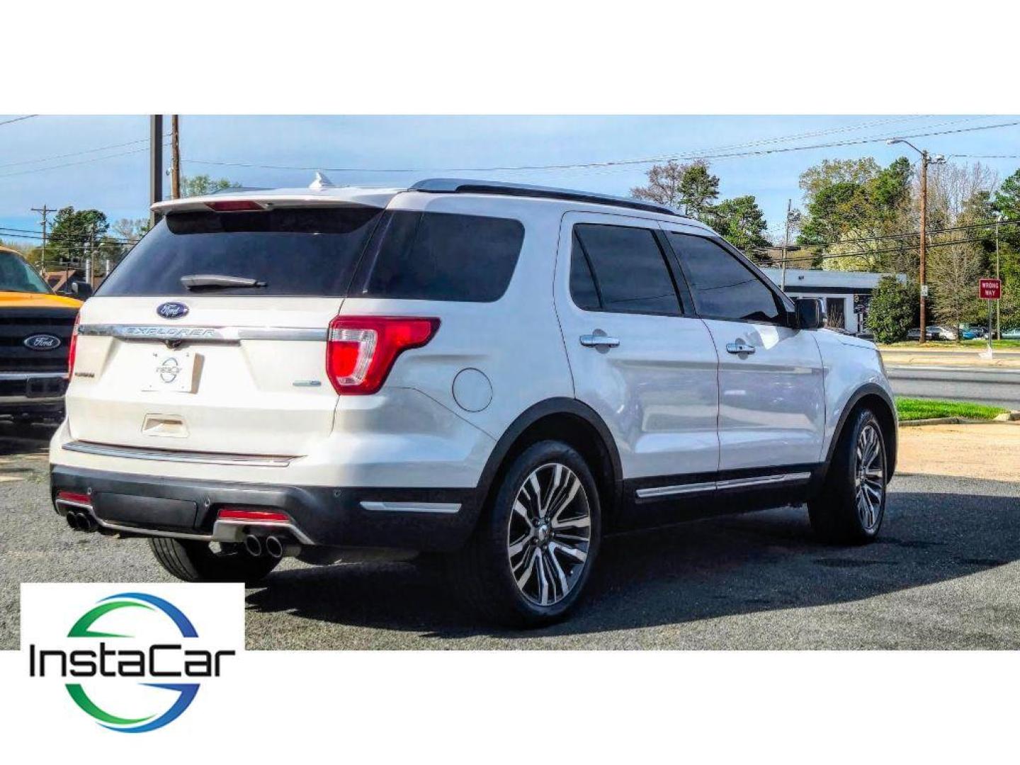 2018 White Platinum Metallic Tri-Coat /Medium Soft Ceramic Ford Explorer Platinum (1FM5K8HT3JG) with an V6, 3.5L engine, 6-speed automatic transmission, located at 6520 E. Independence Blvd., Charlotte, NC, 28212, 35.146019, -80.723465 - <b>Equipment</b><br>The leather seats in this 1/2 ton suv are a must for buyers looking for comfort, durability, and style. Heated seats for those cold winter days are included in this Ford Explorer. The installed navigation system will keep you on the right path. This 2018 Ford Explorer has auto-a - Photo#5