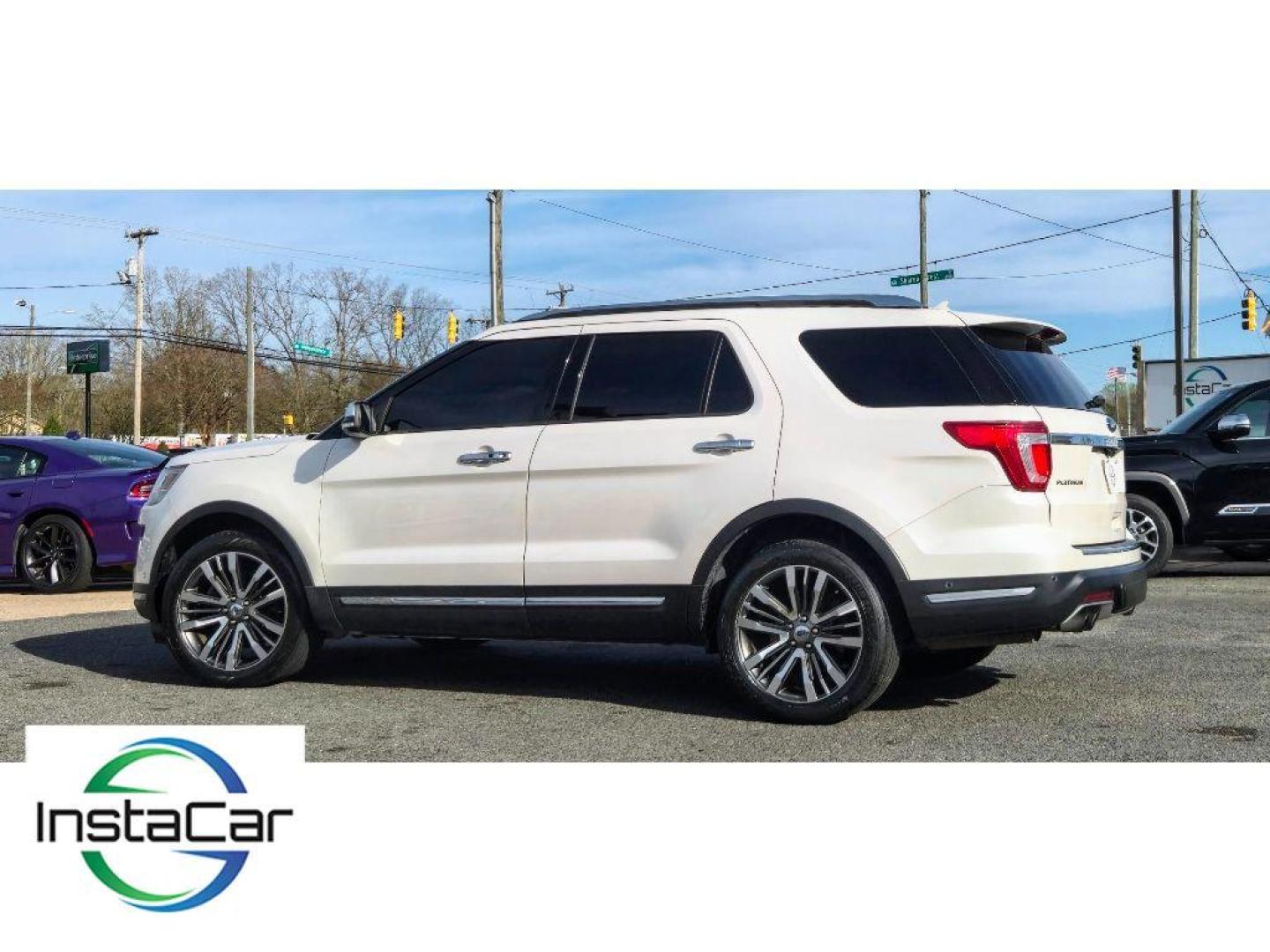 2018 White Platinum Metallic Tri-Coat /Medium Soft Ceramic Ford Explorer Platinum (1FM5K8HT3JG) with an V6, 3.5L engine, 6-speed automatic transmission, located at 6520 E. Independence Blvd., Charlotte, NC, 28212, 35.146019, -80.723465 - <b>Equipment</b><br>The leather seats in this 1/2 ton suv are a must for buyers looking for comfort, durability, and style. Heated seats for those cold winter days are included in this Ford Explorer. The installed navigation system will keep you on the right path. This 2018 Ford Explorer has auto-a - Photo#7