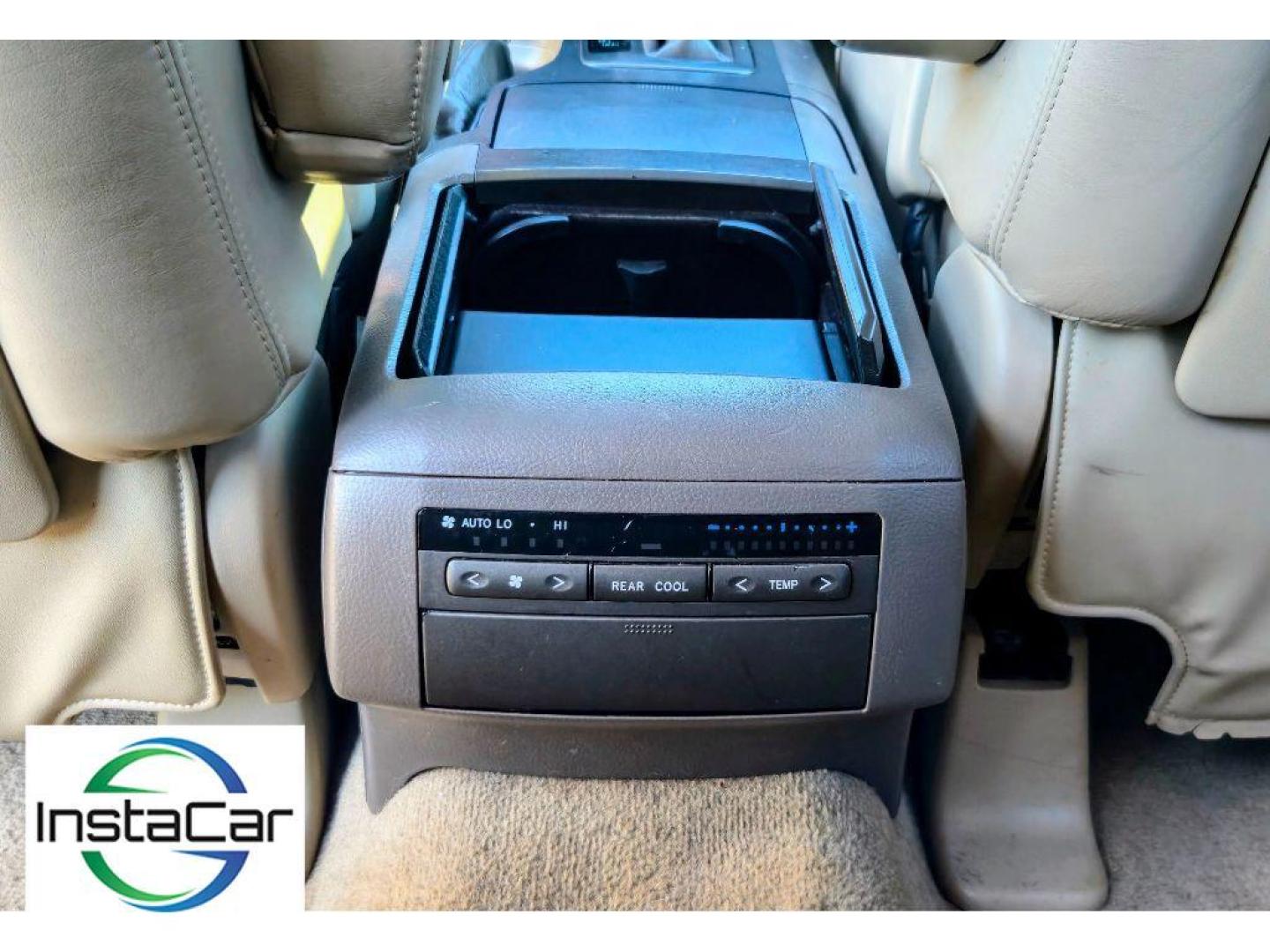 2005 Black Onyx /Ivory Lexus GX 470 Base (JTJBT20X250) with an V8, 4.7L engine, 5-speed automatic transmission, located at 6520 E. Independence Blvd., Charlotte, NC, 28212, 35.146019, -80.723465 - <b>Equipment</b><br>The leather seats in this mid-size suv are a must for buyers looking for comfort, durability, and style. This mid-size suv keeps you comfortable with Auto Climate. The installed navigation system will keep you on the right path. Protect this unit from unwanted accidents with a cu - Photo#5