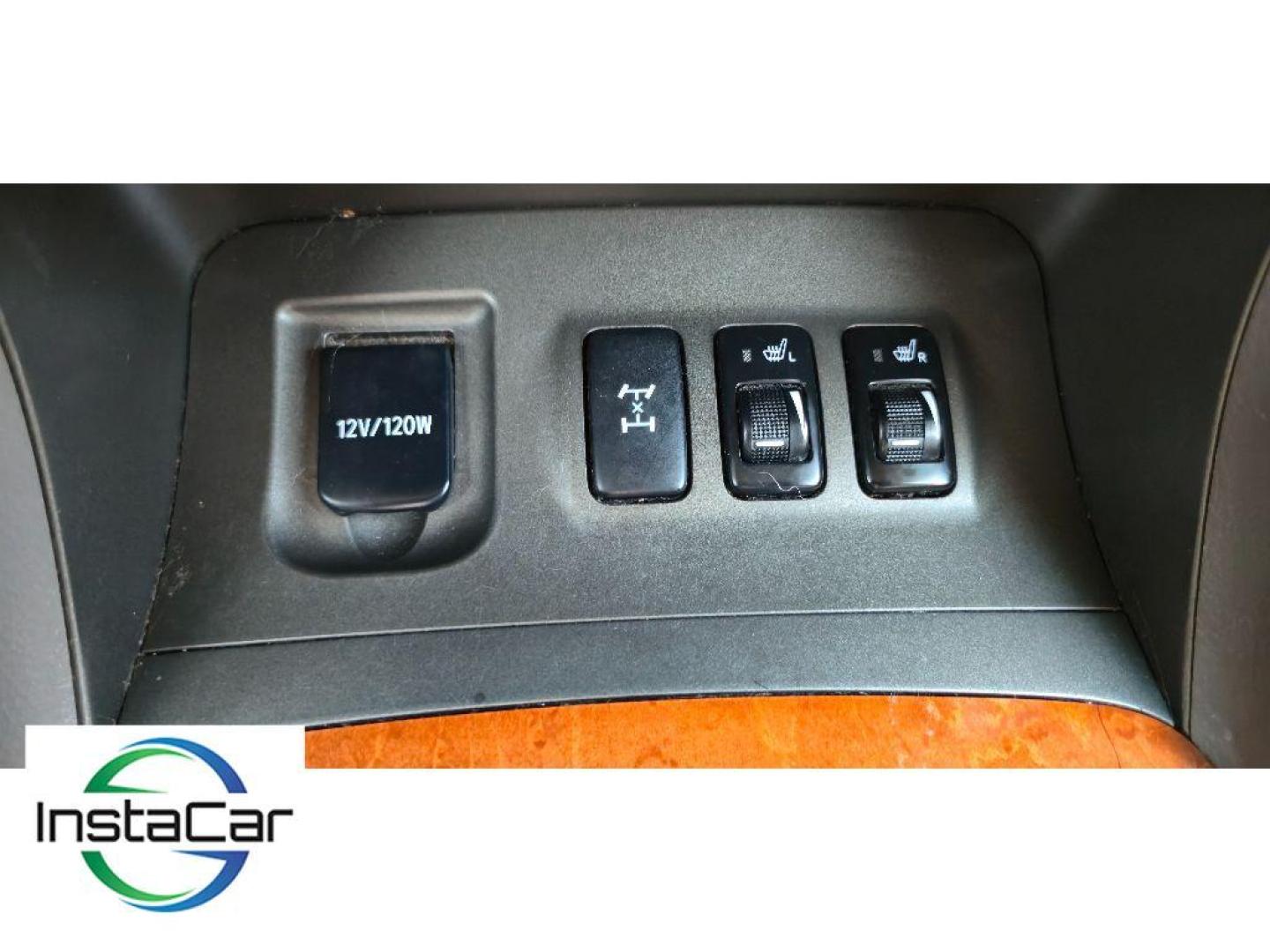 2005 Black Onyx /Ivory Lexus GX 470 Base (JTJBT20X250) with an V8, 4.7L engine, 5-speed automatic transmission, located at 6520 E. Independence Blvd., Charlotte, NC, 28212, 35.146019, -80.723465 - <b>Equipment</b><br>The leather seats in this mid-size suv are a must for buyers looking for comfort, durability, and style. This mid-size suv keeps you comfortable with Auto Climate. The installed navigation system will keep you on the right path. Protect this unit from unwanted accidents with a cu - Photo#12