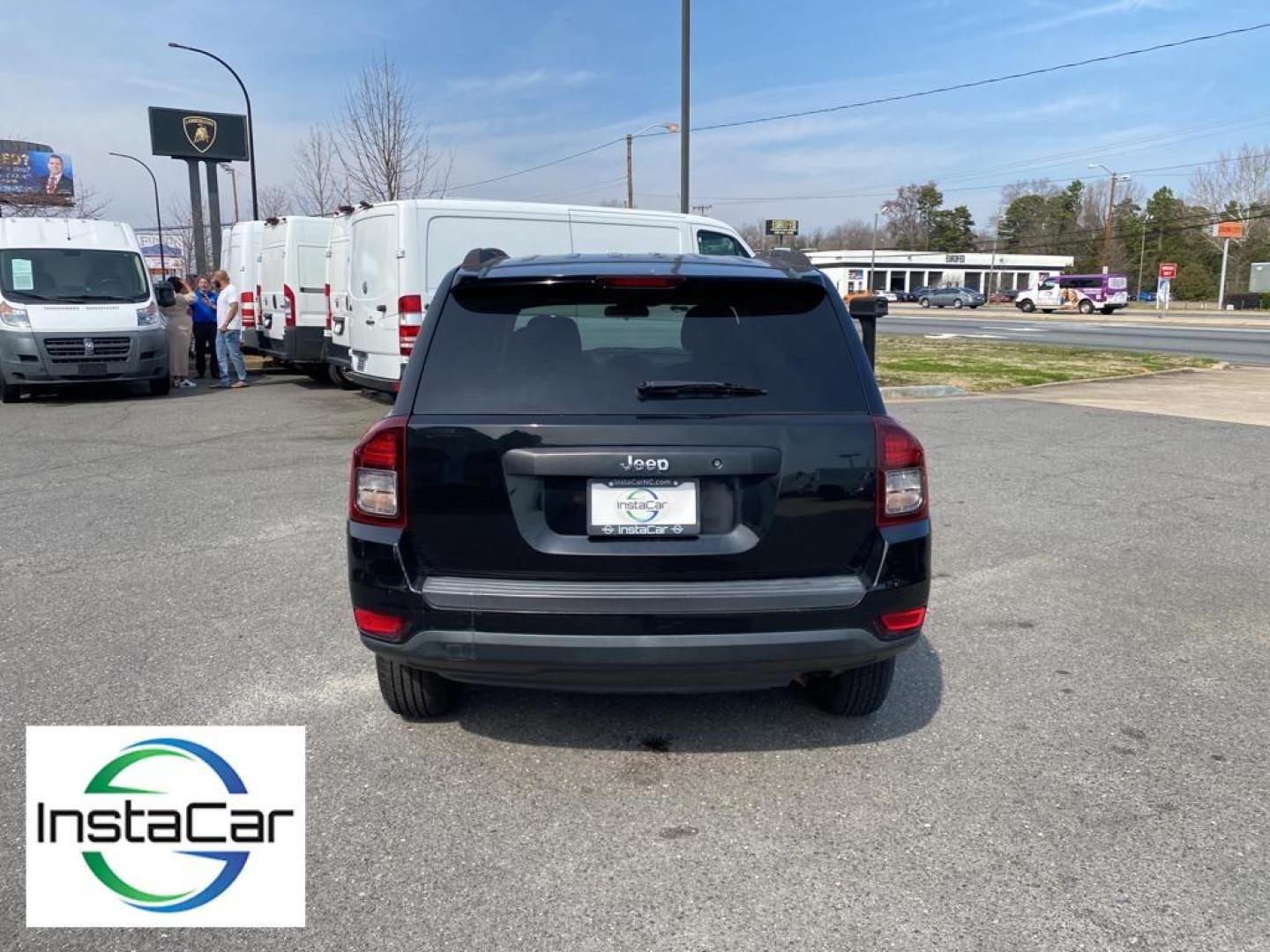 2014 Black Clearcoat /Dark Slate Gray Jeep Compass Sport (1C4NJCBA9ED) with an L4, 2.0L engine, 5-speed manual transmission, located at 3147 E Independence Blvd, Charlotte, NC, 28205, 35.200268, -80.773651 - Introducing the impeccable 2014 Jeep Compass Sport, now available at our esteemed dealership. This used gem has been meticulously maintained and is ready to embark on its next adventure with you. With a remarkable mileage of 179,461 miles, this SUV has proven its reliability and longevity, making it - Photo#12