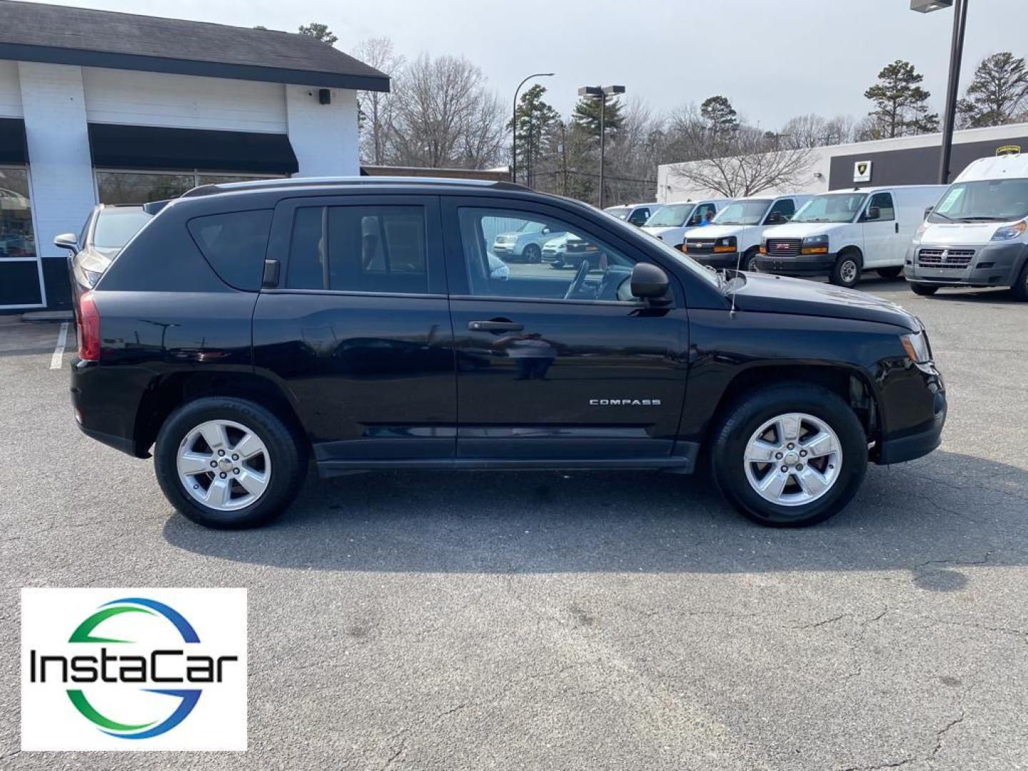 2014 Black Clearcoat /Dark Slate Gray Jeep Compass Sport (1C4NJCBA9ED) with an L4, 2.0L engine, 5-speed manual transmission, located at 3147 E Independence Blvd, Charlotte, NC, 28205, 35.200268, -80.773651 - Introducing the impeccable 2014 Jeep Compass Sport, now available at our esteemed dealership. This used gem has been meticulously maintained and is ready to embark on its next adventure with you. With a remarkable mileage of 179,461 miles, this SUV has proven its reliability and longevity, making it - Photo#14