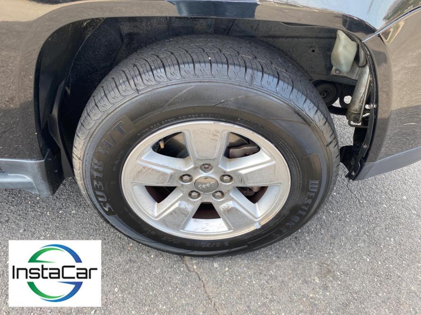 2014 Black Clearcoat /Dark Slate Gray Jeep Compass Sport (1C4NJCBA9ED) with an L4, 2.0L engine, 5-speed manual transmission, located at 3147 E Independence Blvd, Charlotte, NC, 28205, 35.200268, -80.773651 - Introducing the impeccable 2014 Jeep Compass Sport, now available at our esteemed dealership. This used gem has been meticulously maintained and is ready to embark on its next adventure with you. With a remarkable mileage of 179,461 miles, this SUV has proven its reliability and longevity, making it - Photo#16