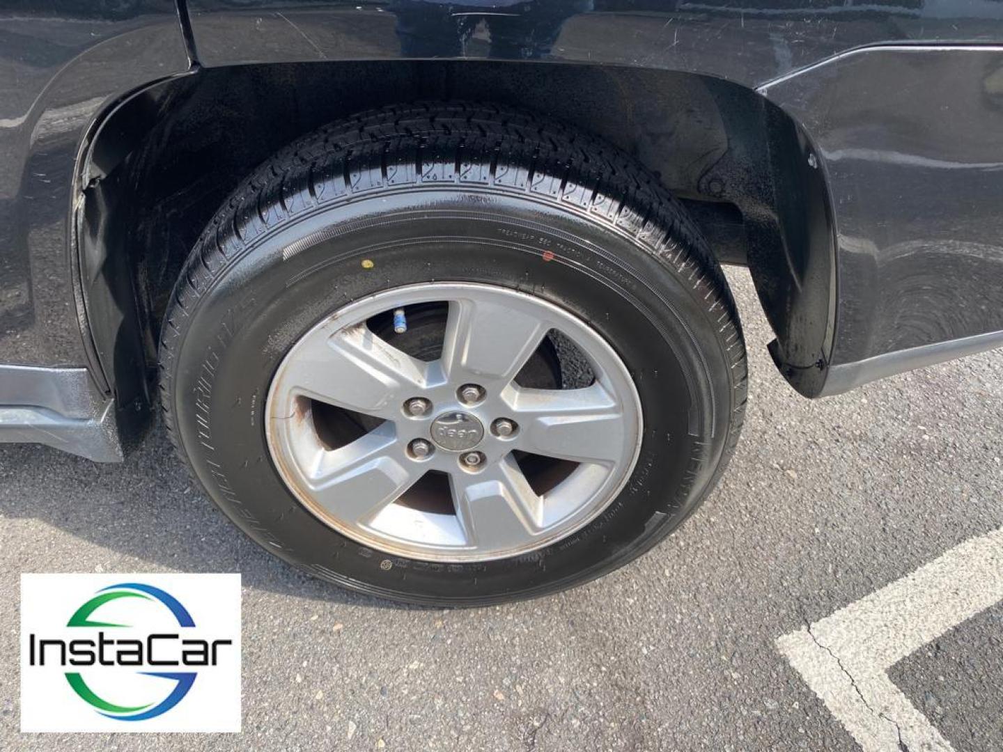 2014 Black Clearcoat /Dark Slate Gray Jeep Compass Sport (1C4NJCBA9ED) with an L4, 2.0L engine, 5-speed manual transmission, located at 3147 E Independence Blvd, Charlotte, NC, 28205, 35.200268, -80.773651 - Introducing the impeccable 2014 Jeep Compass Sport, now available at our esteemed dealership. This used gem has been meticulously maintained and is ready to embark on its next adventure with you. With a remarkable mileage of 179,461 miles, this SUV has proven its reliability and longevity, making it - Photo#18