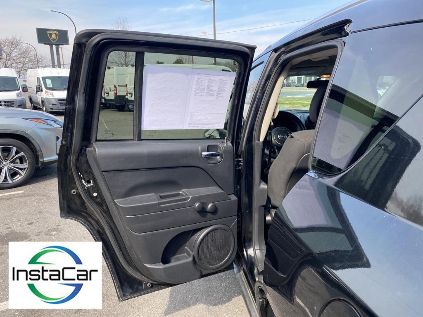 2014 Black Clearcoat /Dark Slate Gray Jeep Compass Sport (1C4NJCBA9ED) with an L4, 2.0L engine, 5-speed manual transmission, located at 3147 E Independence Blvd, Charlotte, NC, 28205, 35.200268, -80.773651 - Introducing the impeccable 2014 Jeep Compass Sport, now available at our esteemed dealership. This used gem has been meticulously maintained and is ready to embark on its next adventure with you. With a remarkable mileage of 179,461 miles, this SUV has proven its reliability and longevity, making it - Photo#20