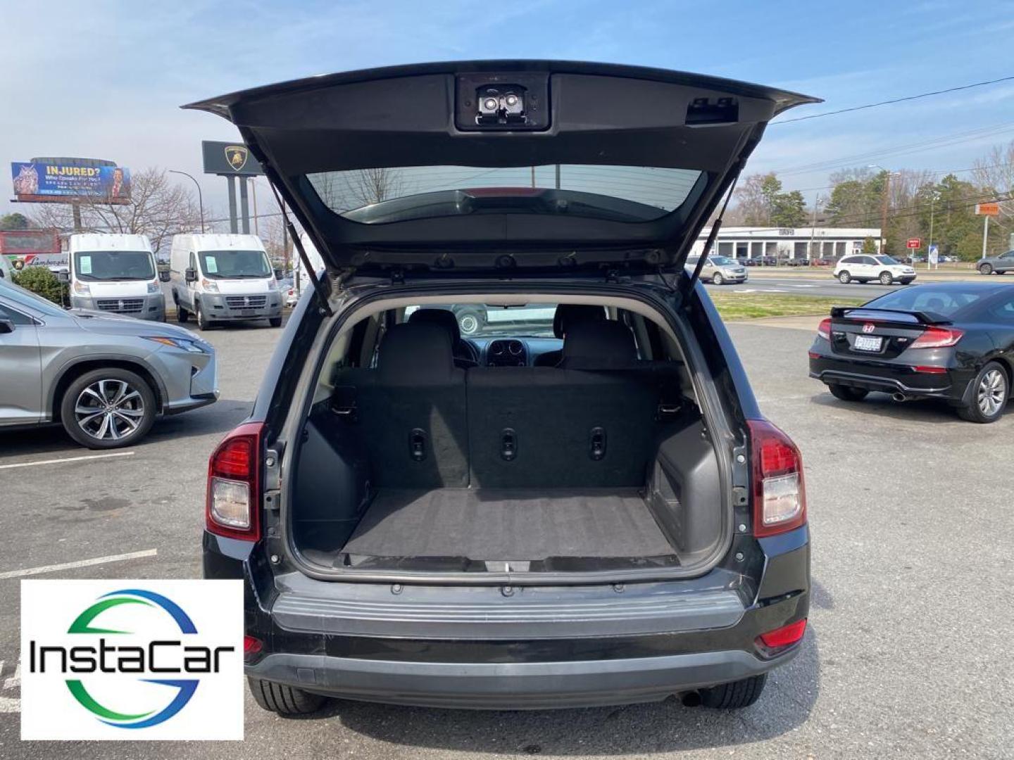 2014 Black Clearcoat /Dark Slate Gray Jeep Compass Sport (1C4NJCBA9ED) with an L4, 2.0L engine, 5-speed manual transmission, located at 3147 E Independence Blvd, Charlotte, NC, 28205, 35.200268, -80.773651 - Introducing the impeccable 2014 Jeep Compass Sport, now available at our esteemed dealership. This used gem has been meticulously maintained and is ready to embark on its next adventure with you. With a remarkable mileage of 179,461 miles, this SUV has proven its reliability and longevity, making it - Photo#27