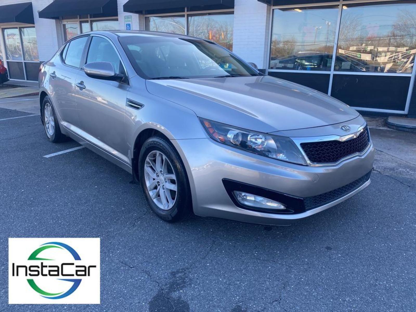 2012 Silver Kia Optima LX (KNAGM4A71C5) with an L4, 2.4L engine, Automatic transmission, located at 3147 E Independence Blvd, Charlotte, NC, 28205, 35.200268, -80.773651 - <b>Equipment</b><br>The Kia Optima features a hands-free Bluetooth phone system. This Kia Optima has satellite radio capabilities. This unit gleams with an elegant silver clear coated finish. Front wheel drive on the Kia Optima gives you better traction and better fuel economy. This mid-size car has - Photo #1