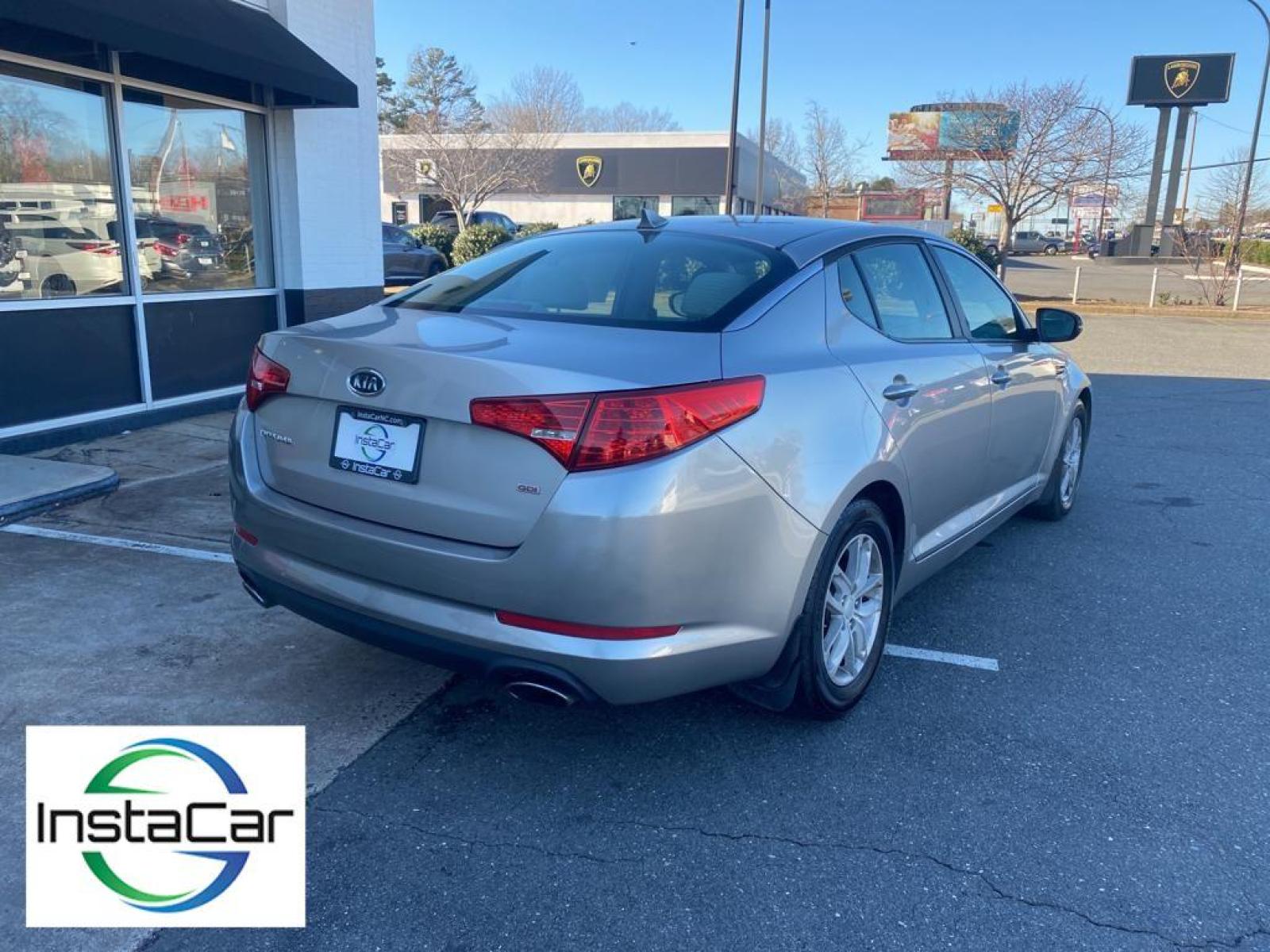 2012 Silver Kia Optima LX (KNAGM4A71C5) with an L4, 2.4L engine, Automatic transmission, located at 3147 E Independence Blvd, Charlotte, NC, 28205, 35.200268, -80.773651 - <b>Equipment</b><br>The Kia Optima features a hands-free Bluetooth phone system. This Kia Optima has satellite radio capabilities. This unit gleams with an elegant silver clear coated finish. Front wheel drive on the Kia Optima gives you better traction and better fuel economy. This mid-size car has - Photo #5