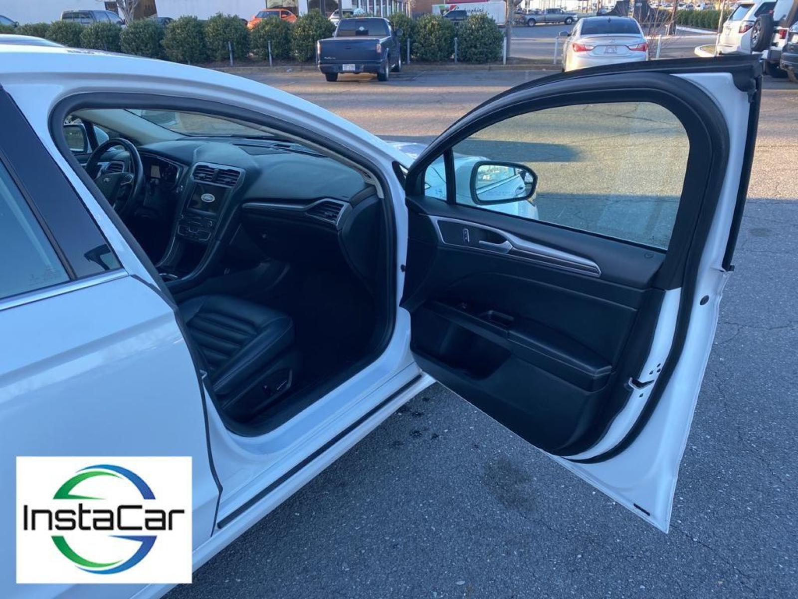 2019 WHITE Ford Fusion SEL (3FA6P0CD0KR) with an 1.5 liter 4 Cylinder Engine engine, 6-SPEED AUTOMATIC W/PADDLE SHIFTERS transmission, located at 3147 E Independence Blvd, Charlotte, NC, 28205, 35.200268, -80.773651 - This vehicle features a hands-free Bluetooth phone system. The rear parking assist technology on this vehicle will put you at ease when reversing. The system alerts you as you get closer to an obstruction. See what's behind you with the back up camera on the Ford Fusion. Front wheel drive on this 2 - Photo #22