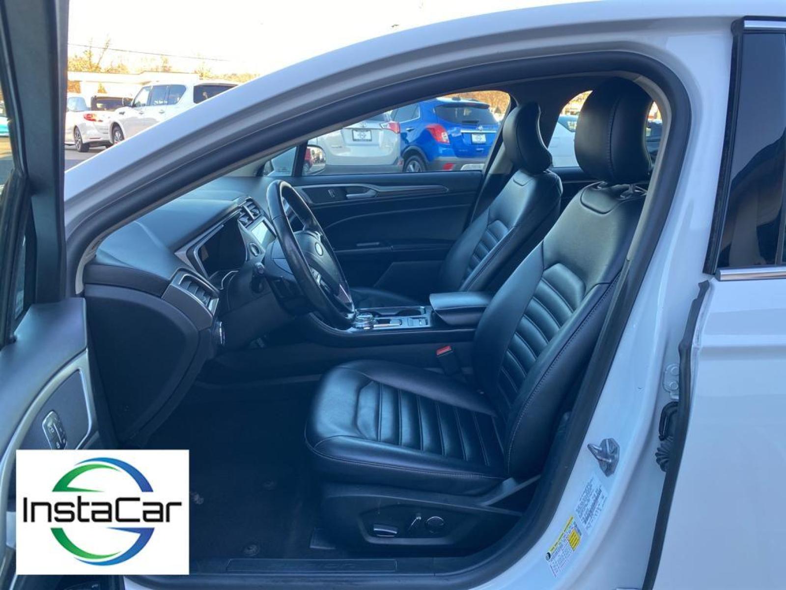 2019 WHITE Ford Fusion SEL (3FA6P0CD0KR) with an 1.5 liter 4 Cylinder Engine engine, 6-SPEED AUTOMATIC W/PADDLE SHIFTERS transmission, located at 3147 E Independence Blvd, Charlotte, NC, 28205, 35.200268, -80.773651 - This vehicle features a hands-free Bluetooth phone system. The rear parking assist technology on this vehicle will put you at ease when reversing. The system alerts you as you get closer to an obstruction. See what's behind you with the back up camera on the Ford Fusion. Front wheel drive on this 2 - Photo #23