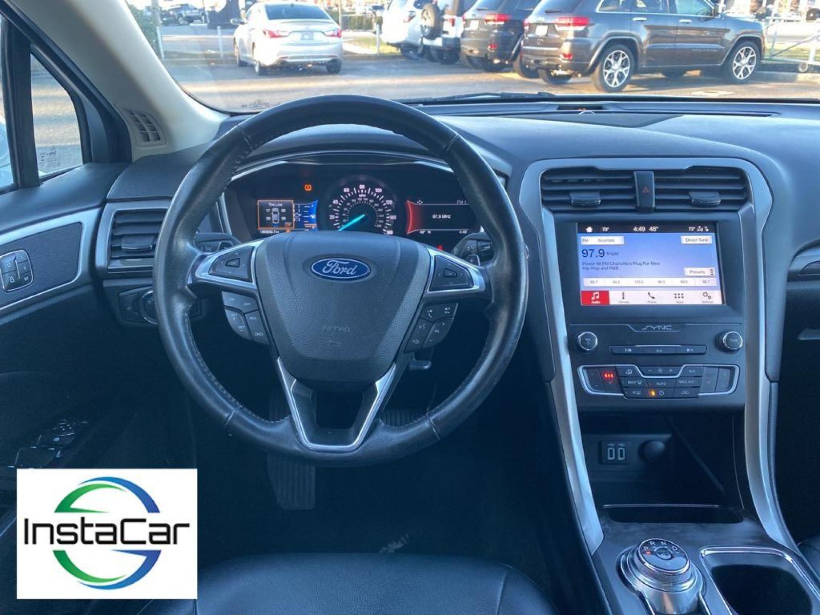 2019 WHITE Ford Fusion SEL (3FA6P0CD0KR) with an 1.5 liter 4 Cylinder Engine engine, 6-SPEED AUTOMATIC W/PADDLE SHIFTERS transmission, located at 3147 E Independence Blvd, Charlotte, NC, 28205, 35.200268, -80.773651 - This vehicle features a hands-free Bluetooth phone system. The rear parking assist technology on this vehicle will put you at ease when reversing. The system alerts you as you get closer to an obstruction. See what's behind you with the back up camera on the Ford Fusion. Front wheel drive on this 2 - Photo #30