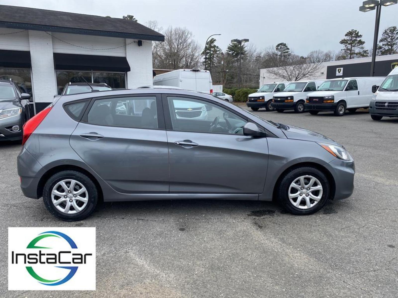 2014 Triathlon Gray Metallic /Black Hyundai Accent GS (KMHCT5AE2EU) with an L4, 1.6L engine, 6-speed automatic transmission, located at 3147 E Independence Blvd, Charlotte, NC, 28205, 35.200268, -80.773651 - <b>Equipment</b><br>This small car has satellite radio capabilities. The vehicle is equipped with the latest generation of XM/Sirius Radio. With the keyless entry system on this small car you can pop the trunk without dropping your bags from the store. Set the temperature exactly where you are most - Photo #13