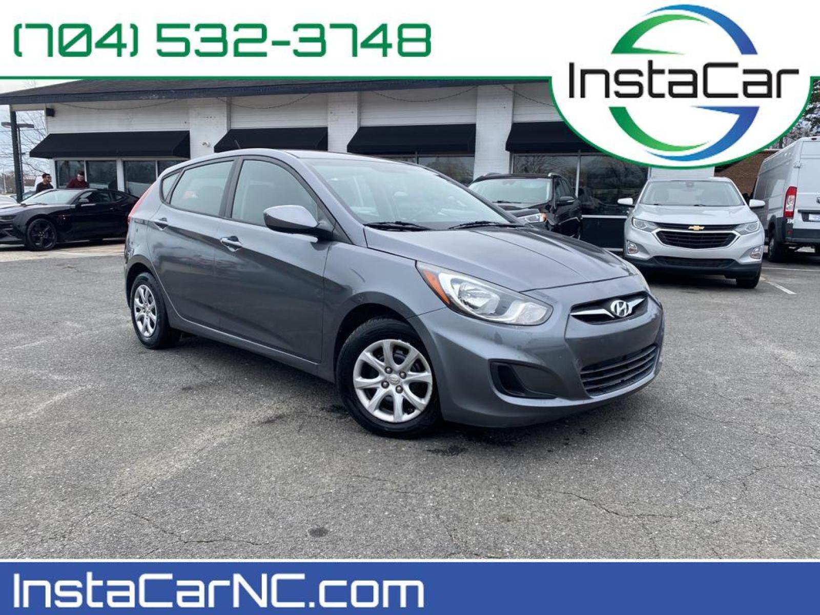 2014 Triathlon Gray Metallic /Black Hyundai Accent GS (KMHCT5AE2EU) with an L4, 1.6L engine, 6-speed automatic transmission, located at 3147 E Independence Blvd, Charlotte, NC, 28205, 35.200268, -80.773651 - <b>Equipment</b><br>This small car has satellite radio capabilities. The vehicle is equipped with the latest generation of XM/Sirius Radio. With the keyless entry system on this small car you can pop the trunk without dropping your bags from the store. Set the temperature exactly where you are most - Photo #0