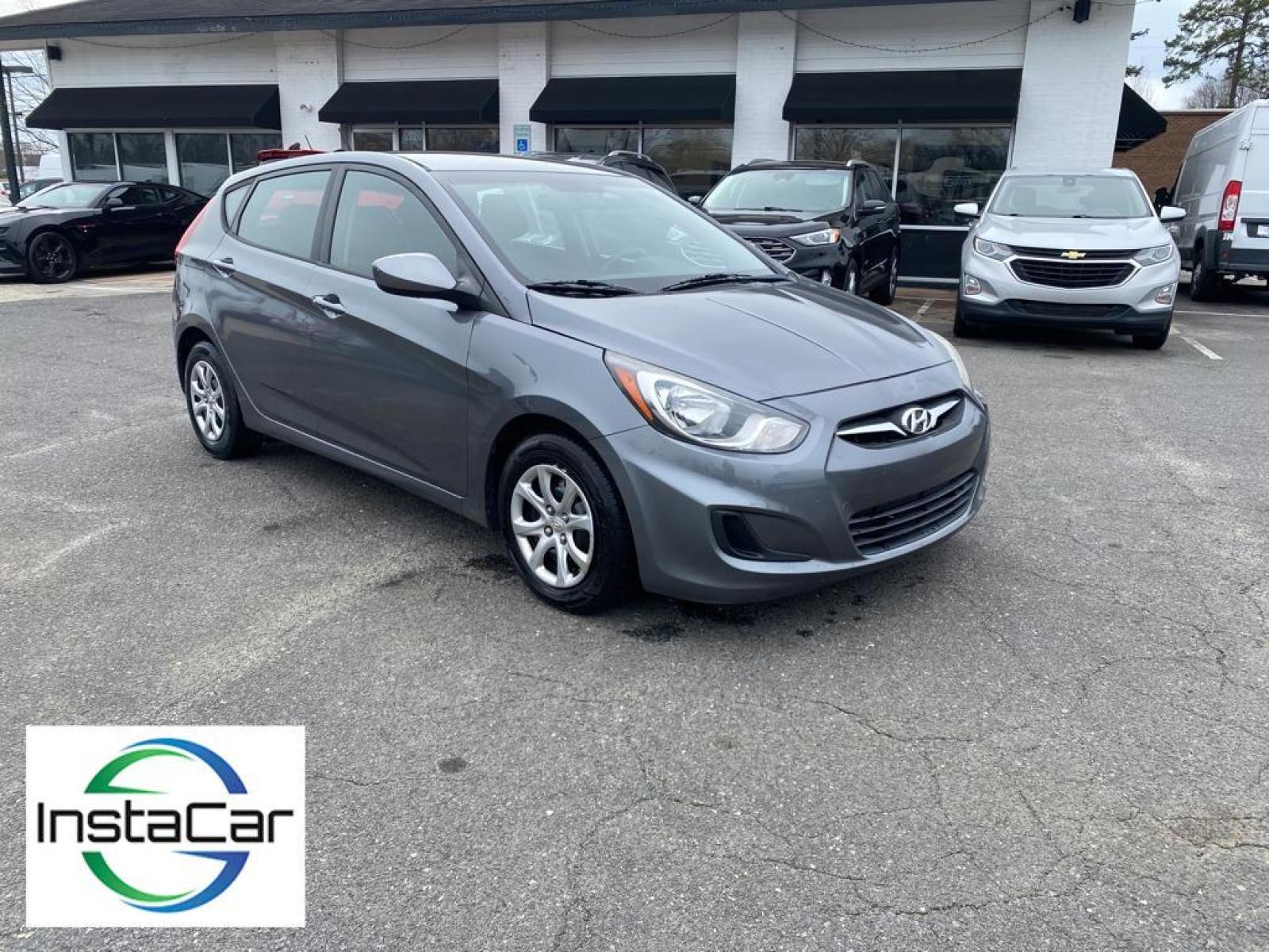 2014 Triathlon Gray Metallic /Black Hyundai Accent GS (KMHCT5AE2EU) with an L4, 1.6L engine, 6-speed automatic transmission, located at 3147 E Independence Blvd, Charlotte, NC, 28205, 35.200268, -80.773651 - <b>Equipment</b><br>with XM/Sirus Satellite Radio you are no longer restricted by poor quality local radio stations while driving this unit. Anywhere on the planet, you will have hundreds of digital stations to choose from. It has satellite radio capabilities. Quickly unlock this vehicle with keyle - Photo #6